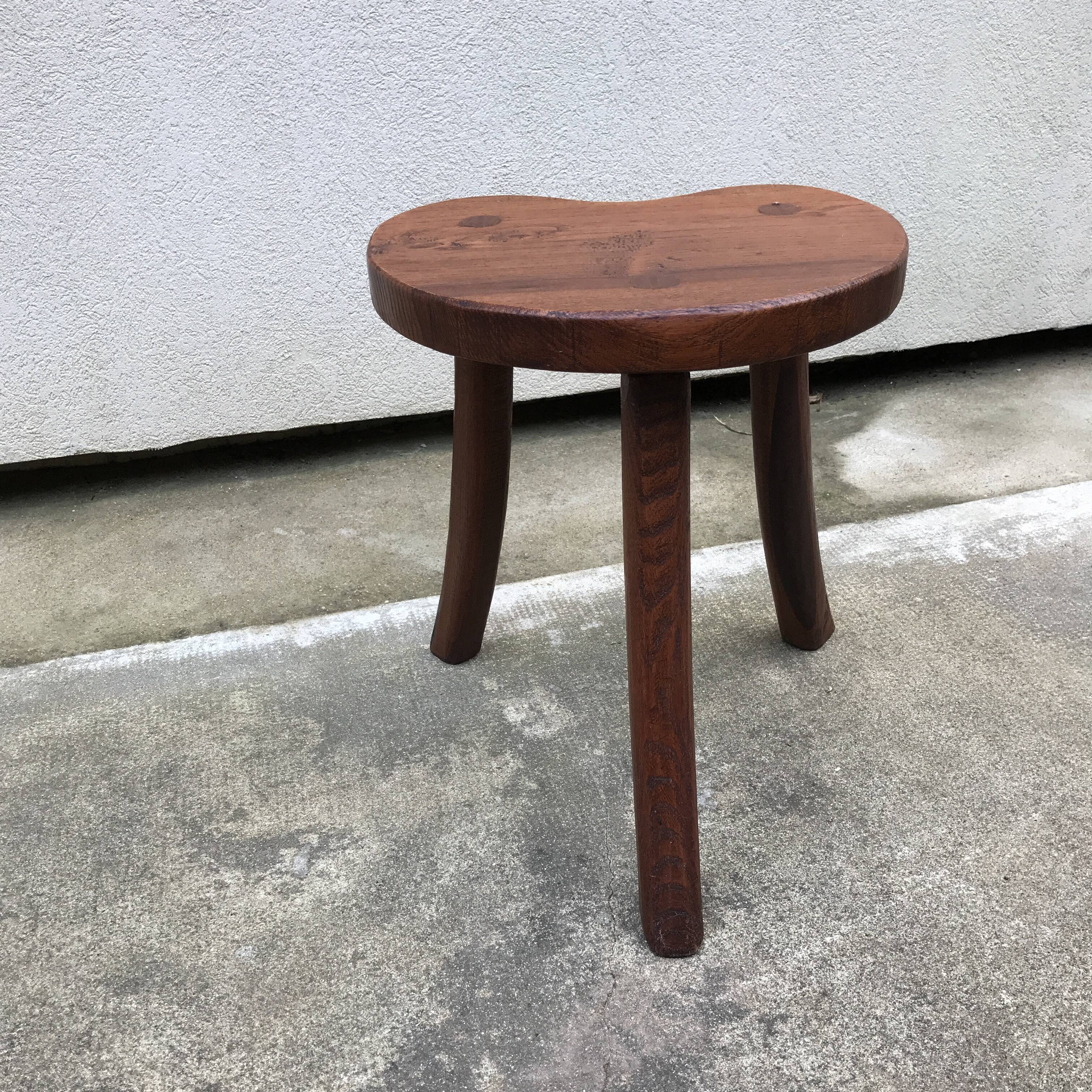 Brutalist tripod standing farm stool