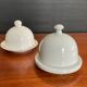 Two vintage porcelain butter dishes