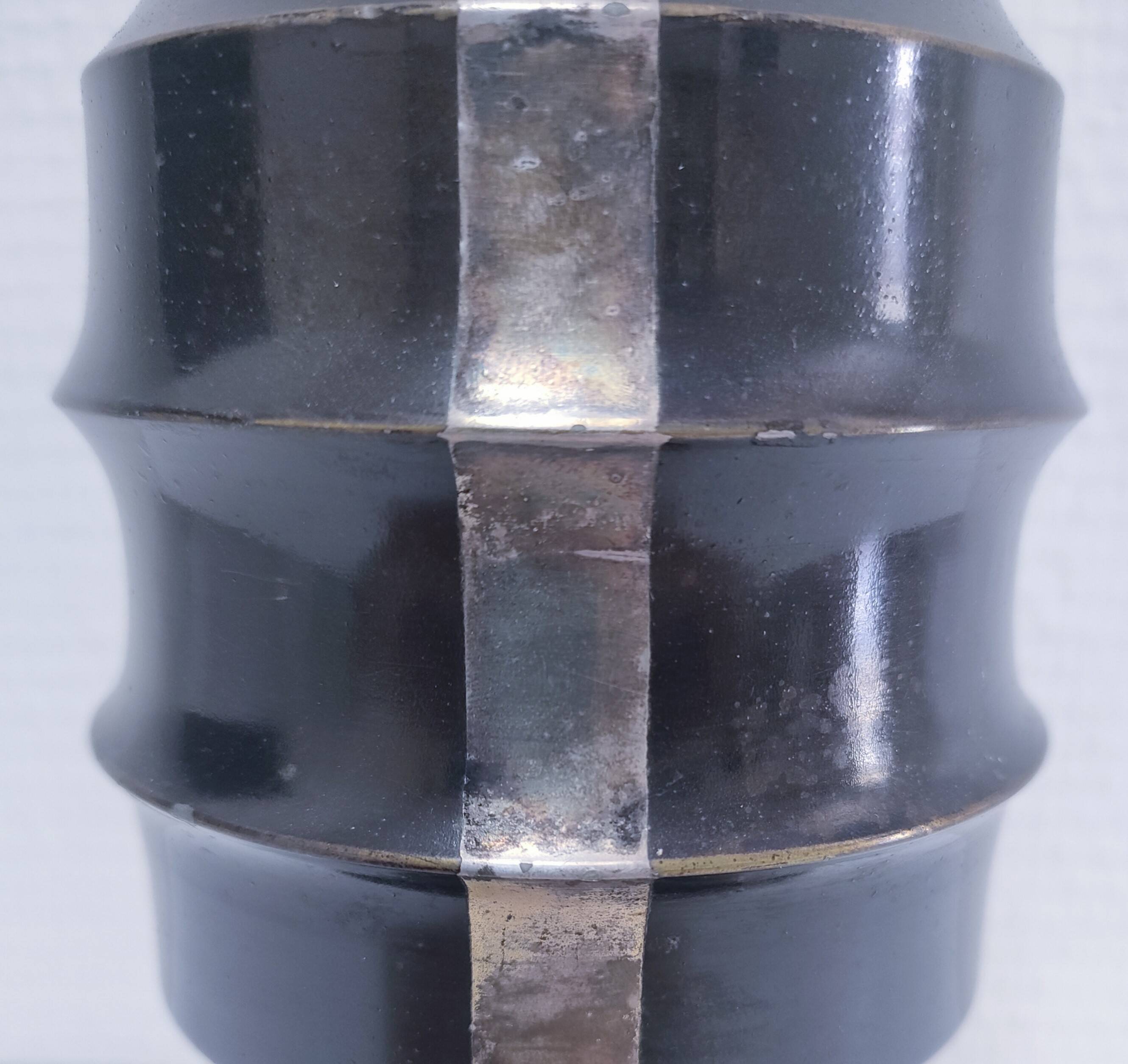 Art Deco metal lamp base with black and silver patina