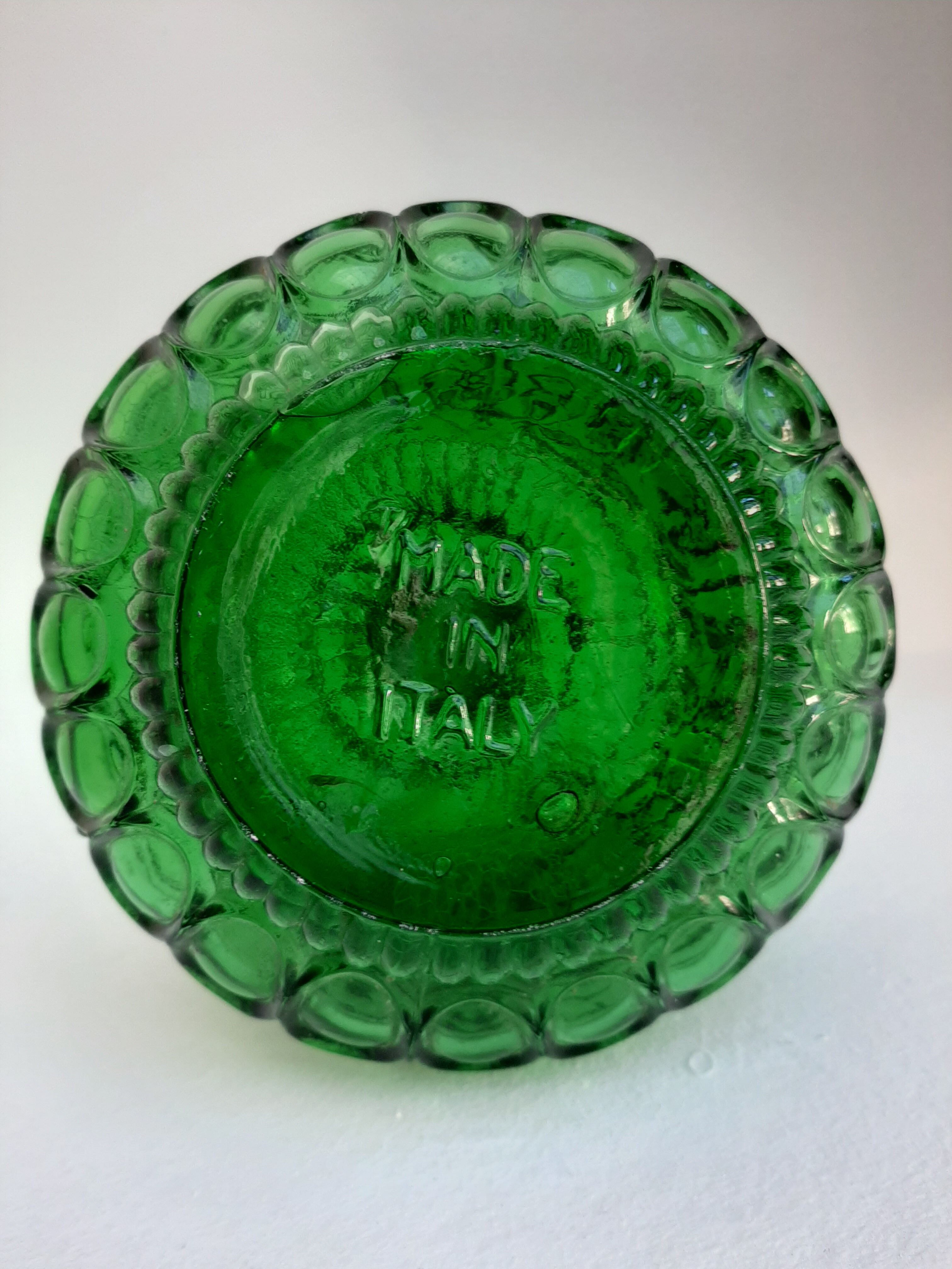 Empoli green glass bottle, zodiac signs
