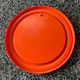 Mirror with round frame in orange molded plastic by carrara & matta, 1974