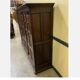 Antique neo-Gothic wardrobe with linen drawers.