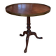 Folding gueridon, tripod in carved mahogany and brass. Late 19th century.
