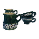 Two cups and two quimper milk jars