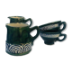Two cups and two quimper milk jars