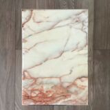 Marble and gilded sofa end