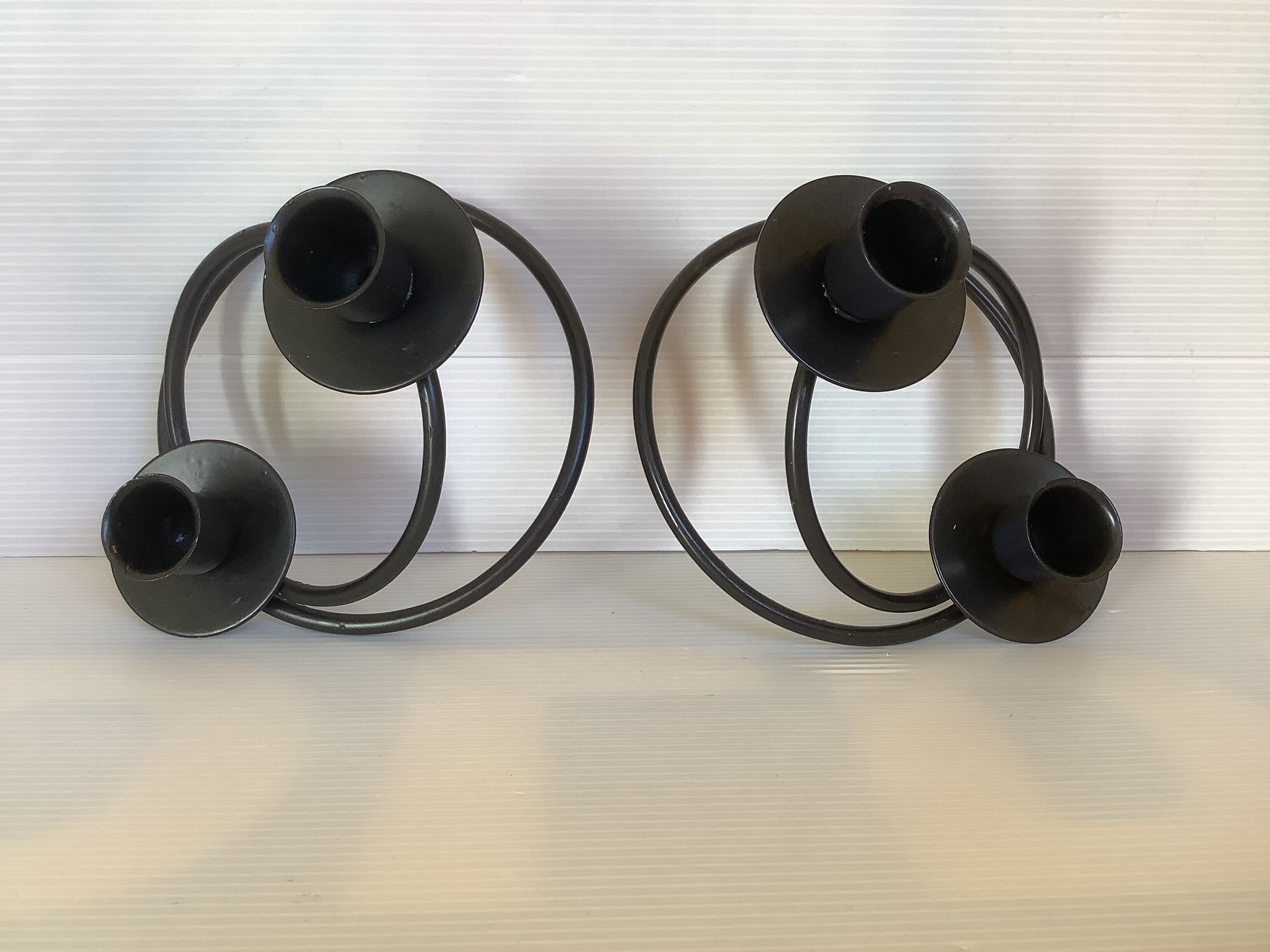 Pair of brutalist black metal candlesticks