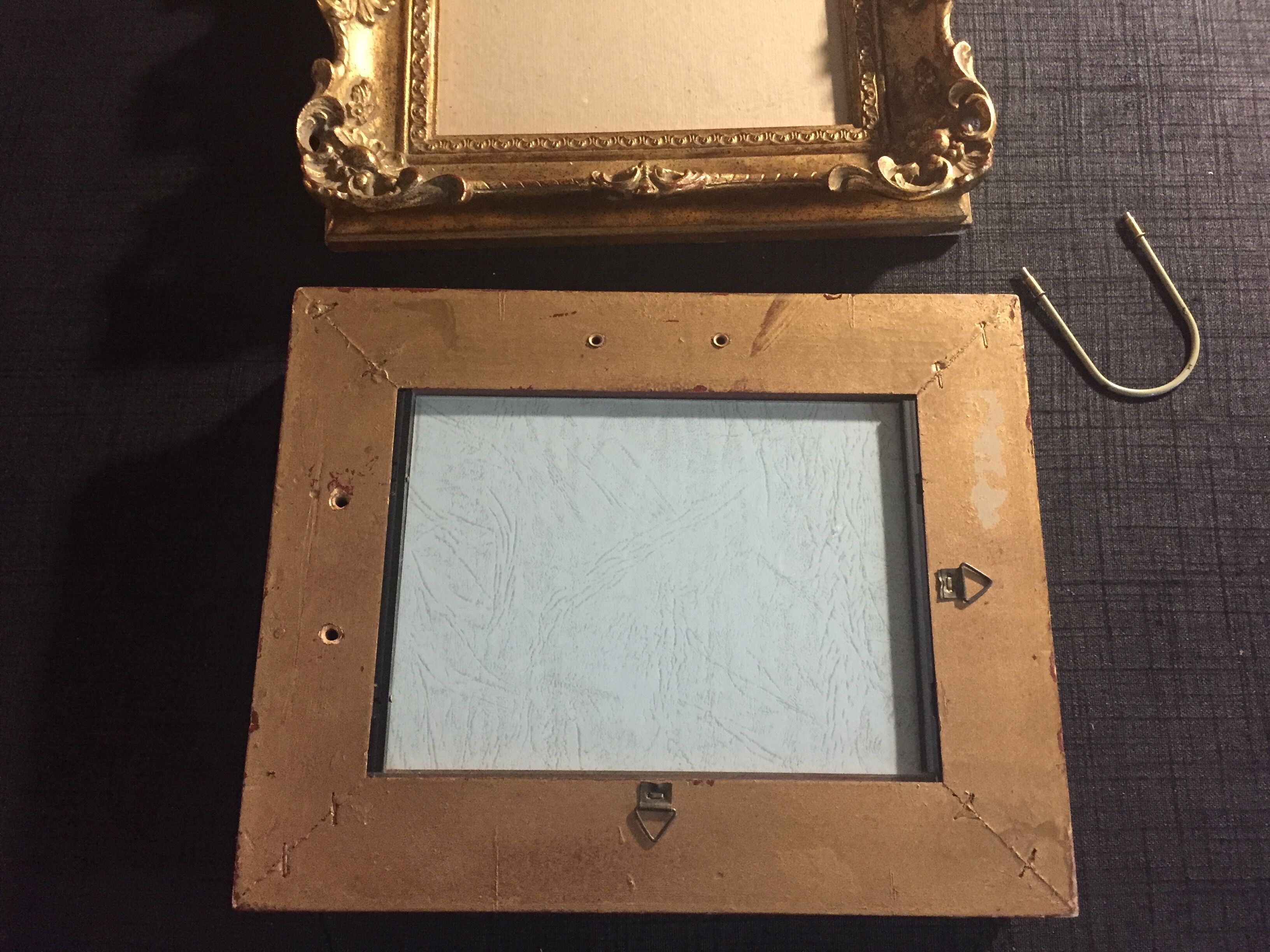 Old gilded frames with mouldings