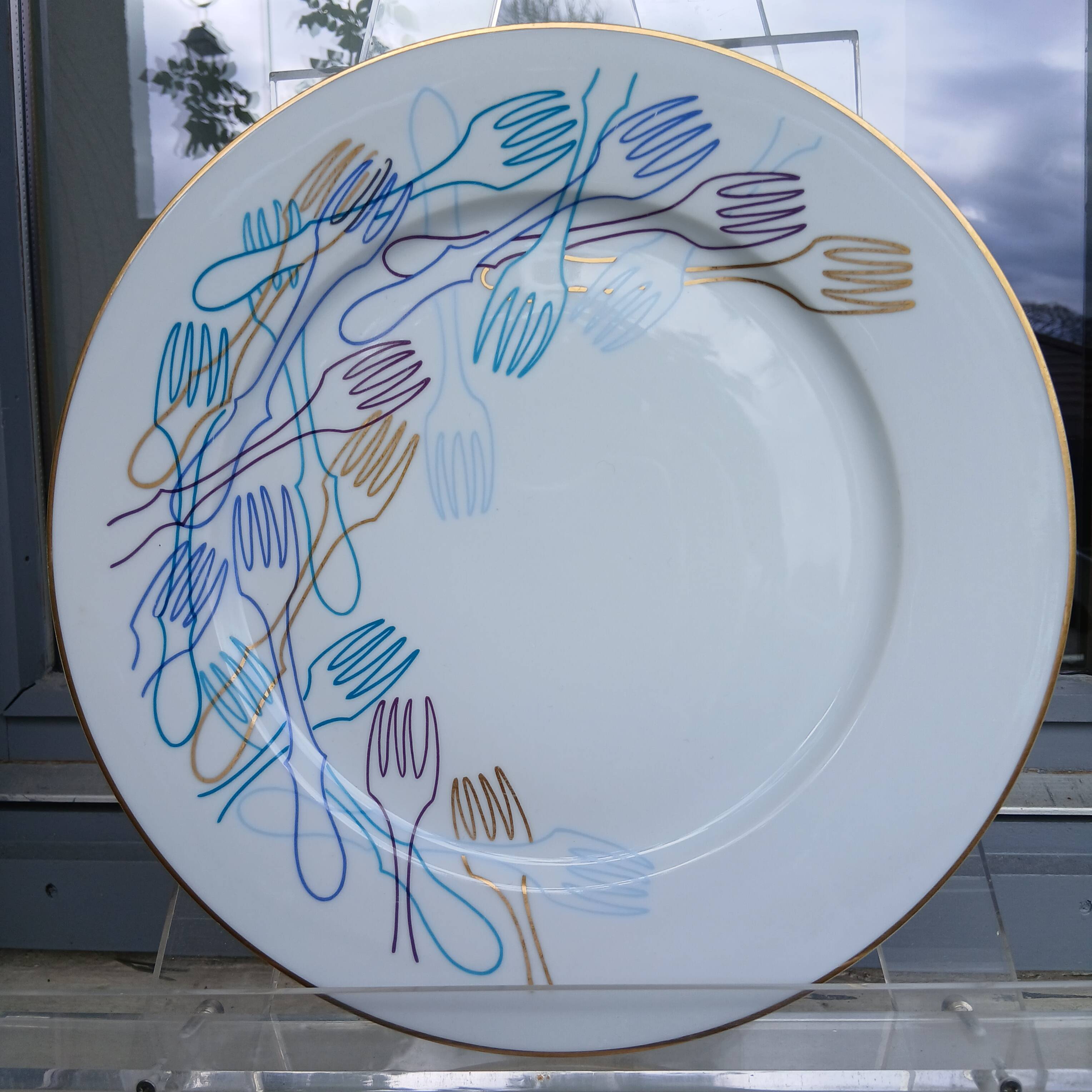 Decorative plate created by Arman.