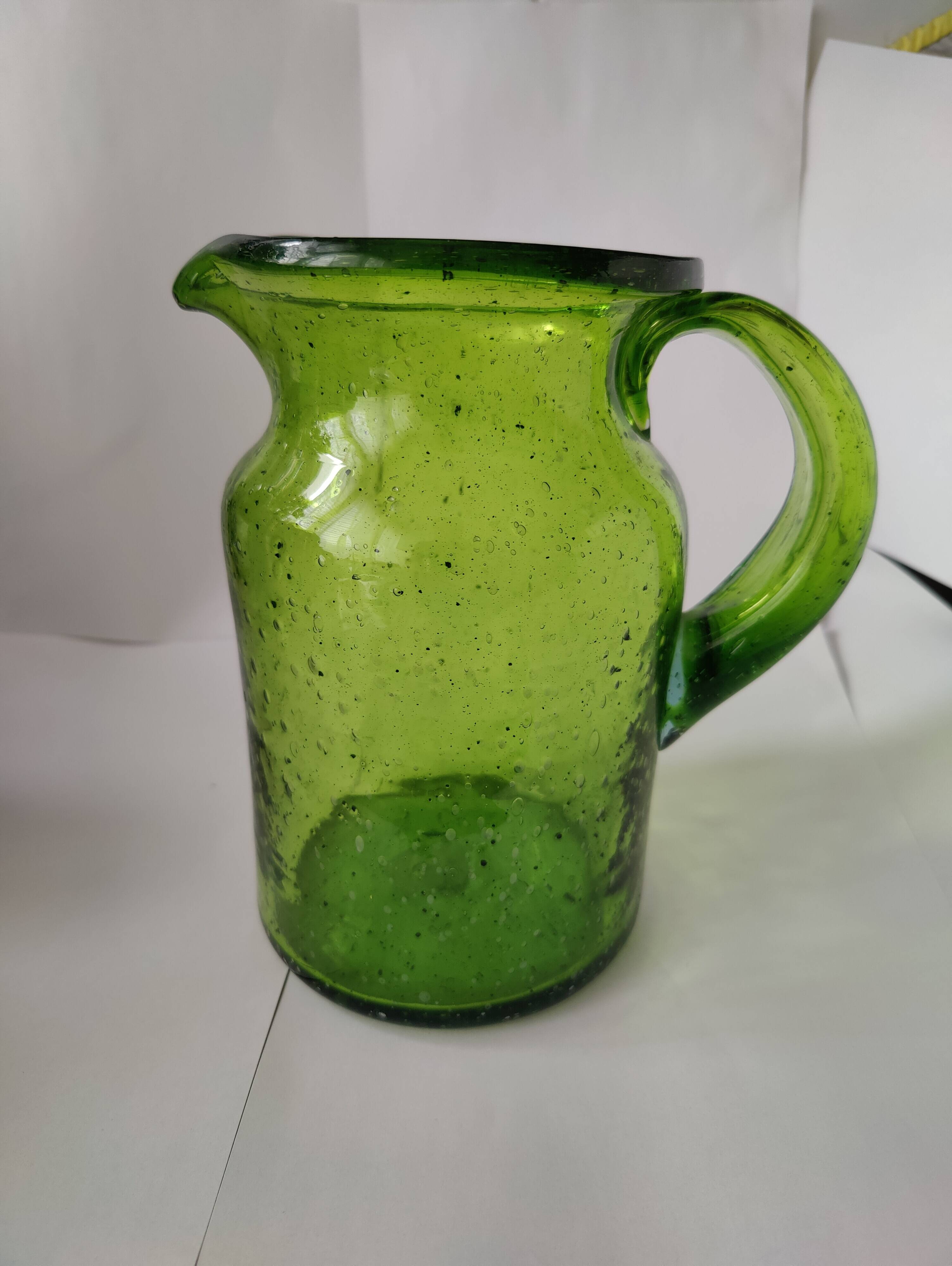 Bubble glass pitcher in the style of Biot or Empoli.