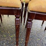 6 dining chairs made of solid mahogany in Regency style with yellow fabric.