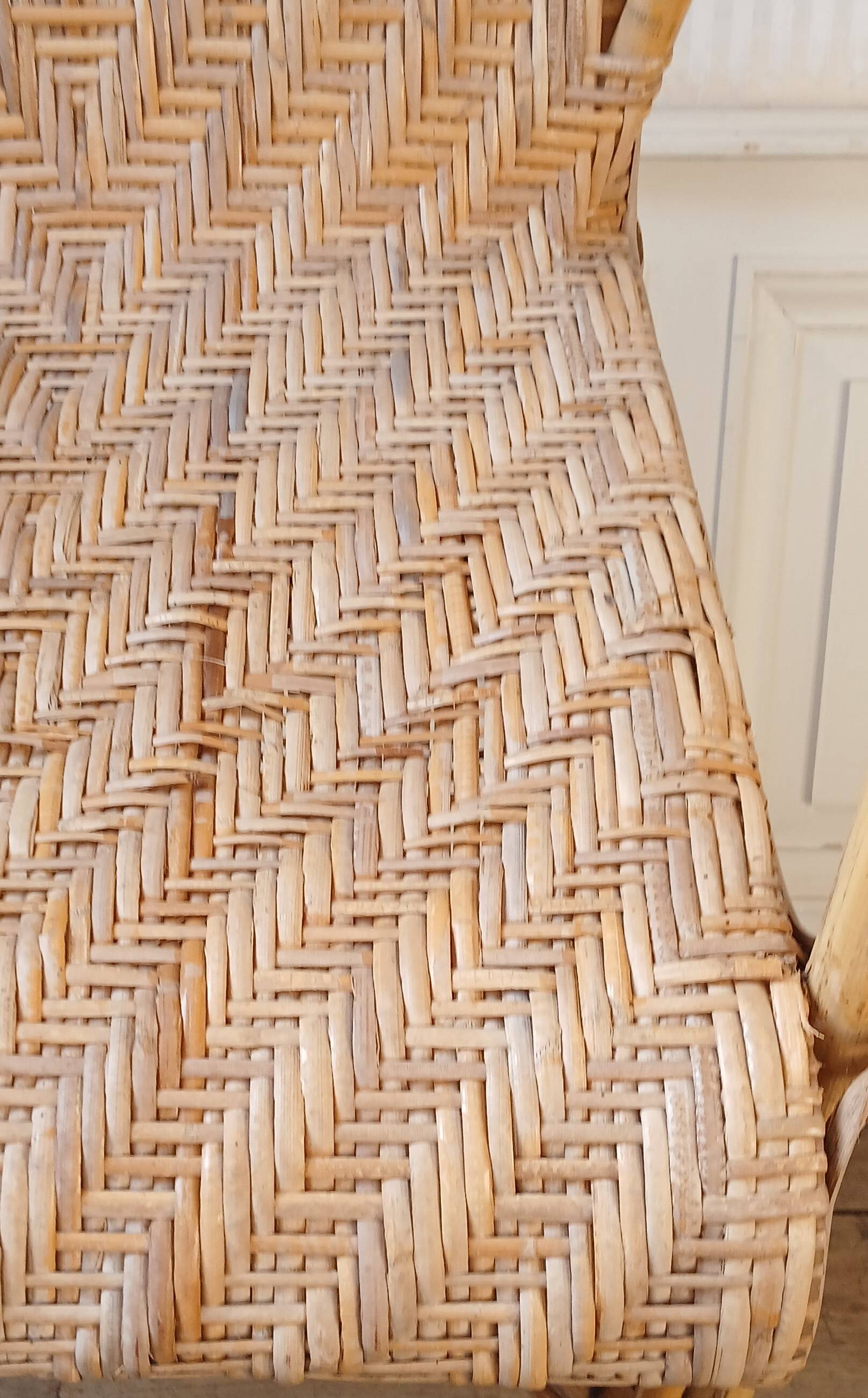 High-backed adult rattan armchair, circa 1960