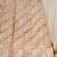 High-backed adult rattan armchair, circa 1960