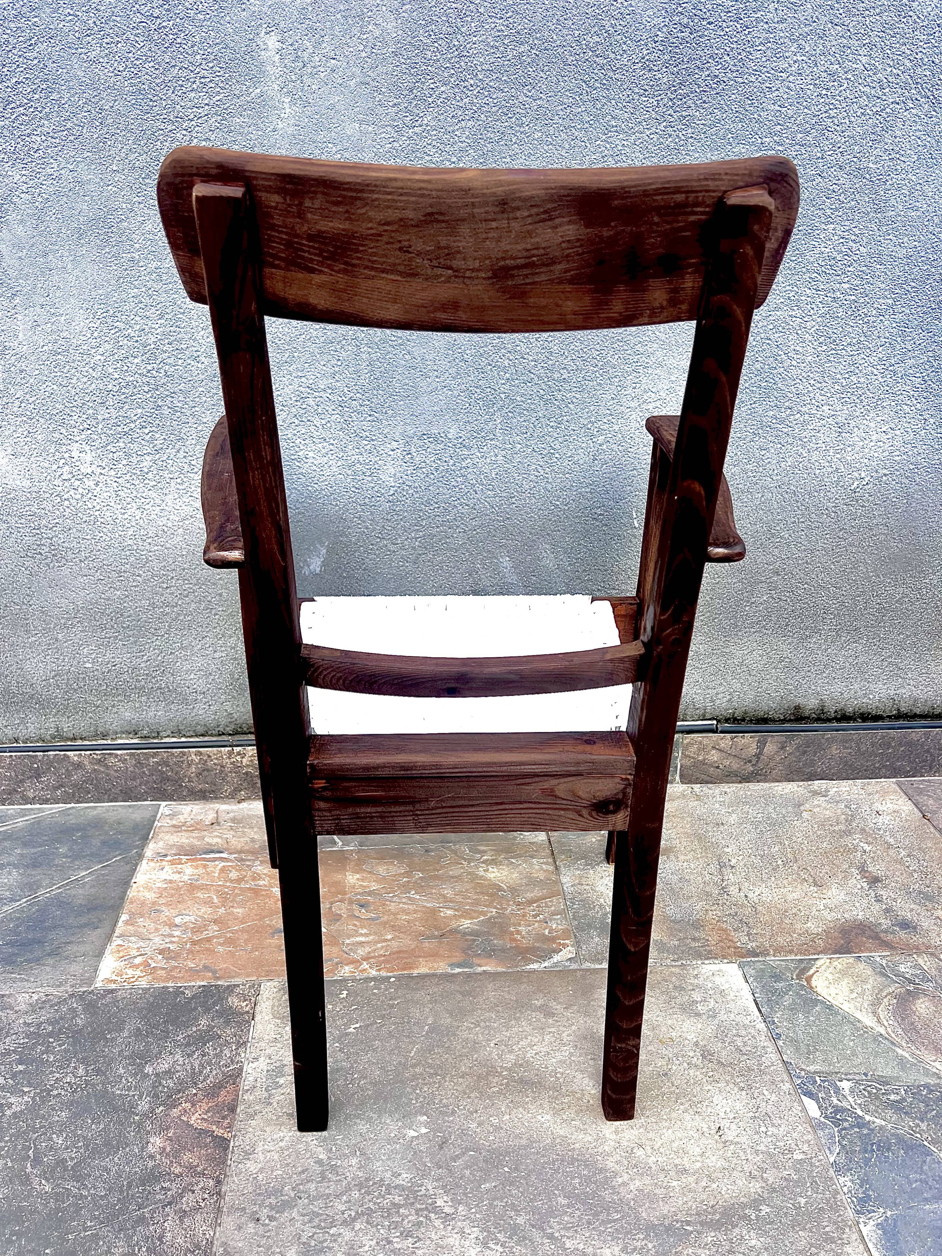 Scandinavian chair in wood and woven natural fibre.