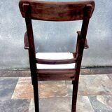 Scandinavian chair in wood and woven natural fibre.