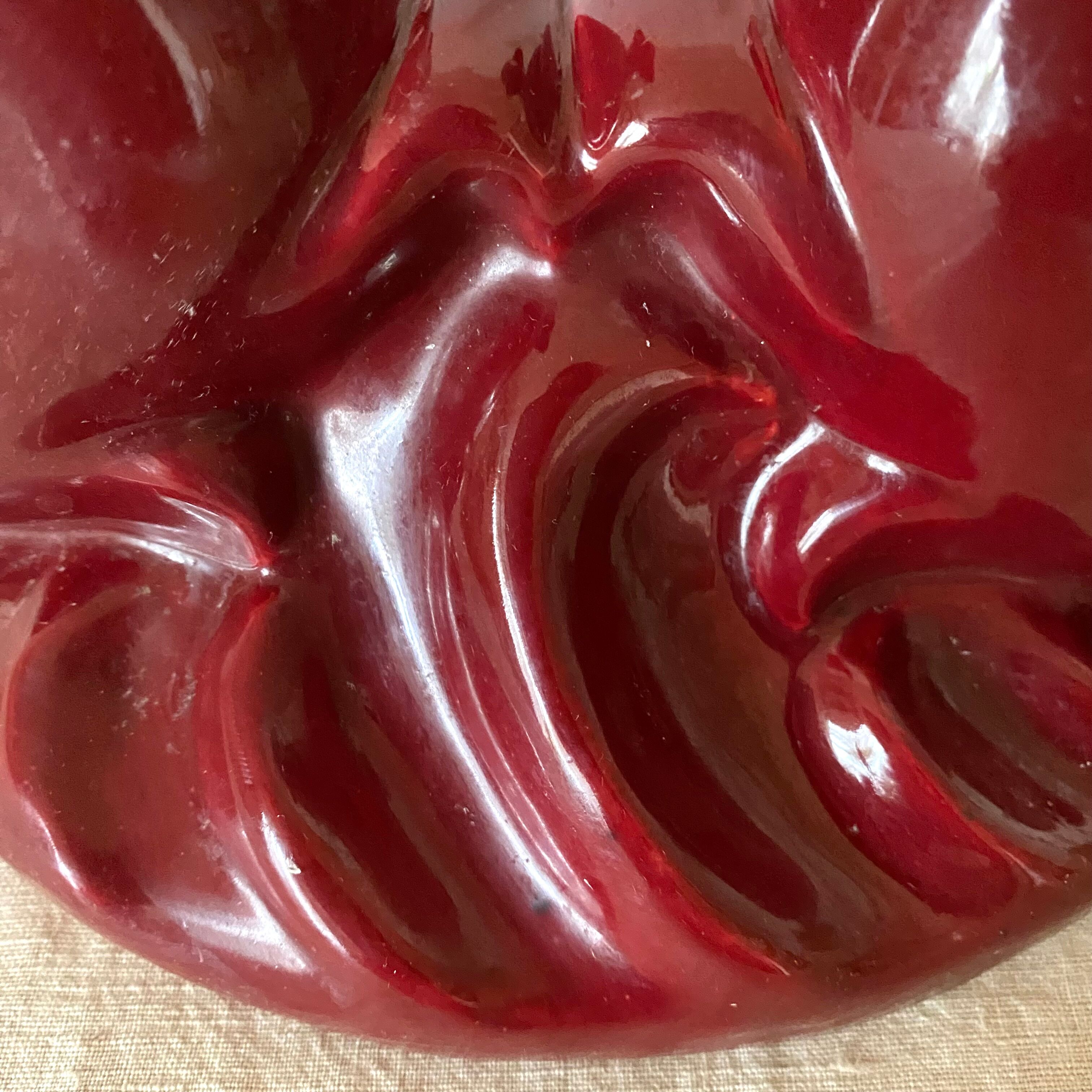 Red ceramic zoomorphic candle holder