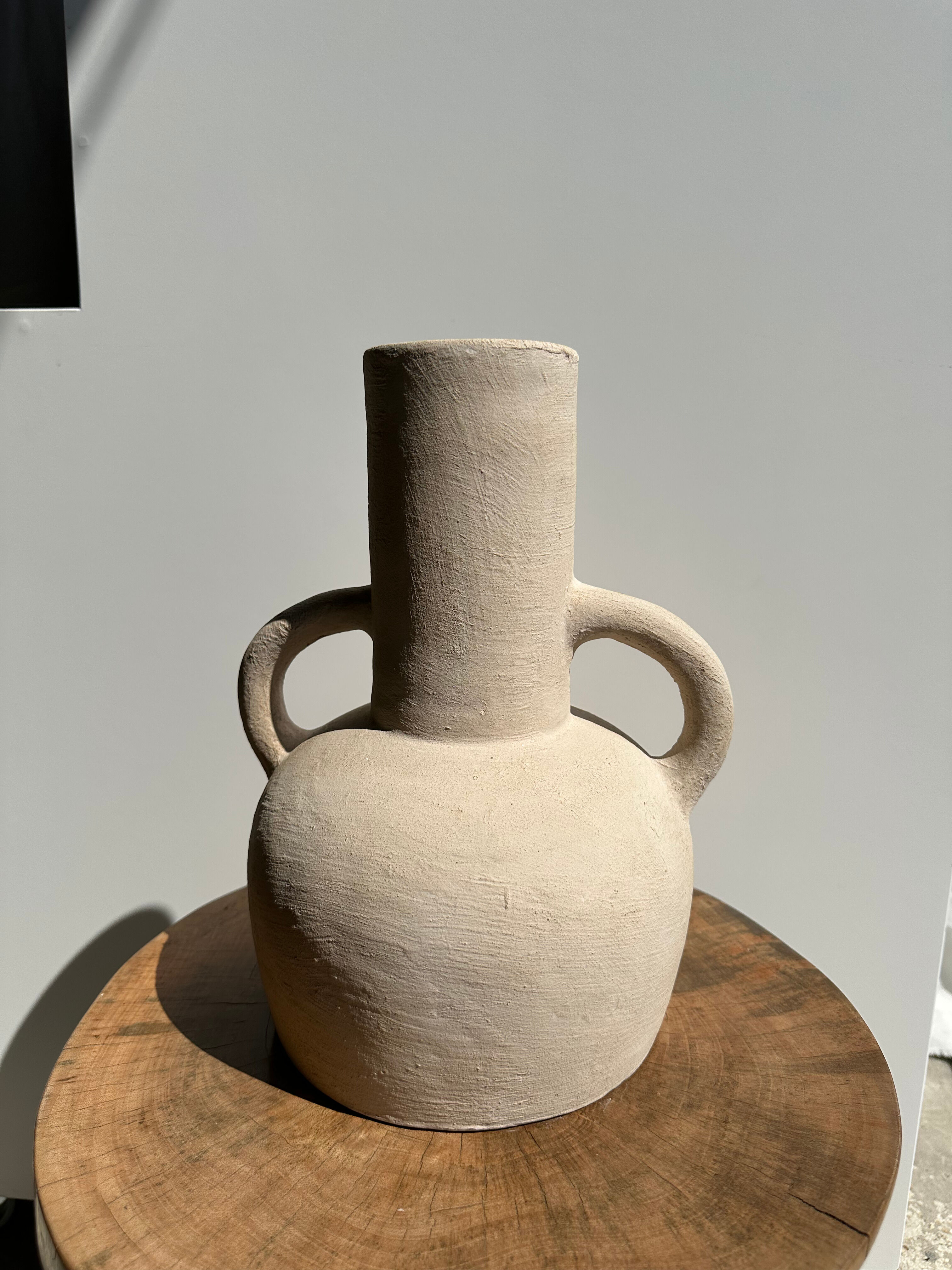 Handmade terracotta vase painted in beige with double handles h:32 d:25