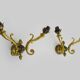 Pair of double-light Empire style wall lights in bronze