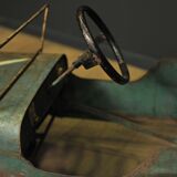 Green metal pedal car