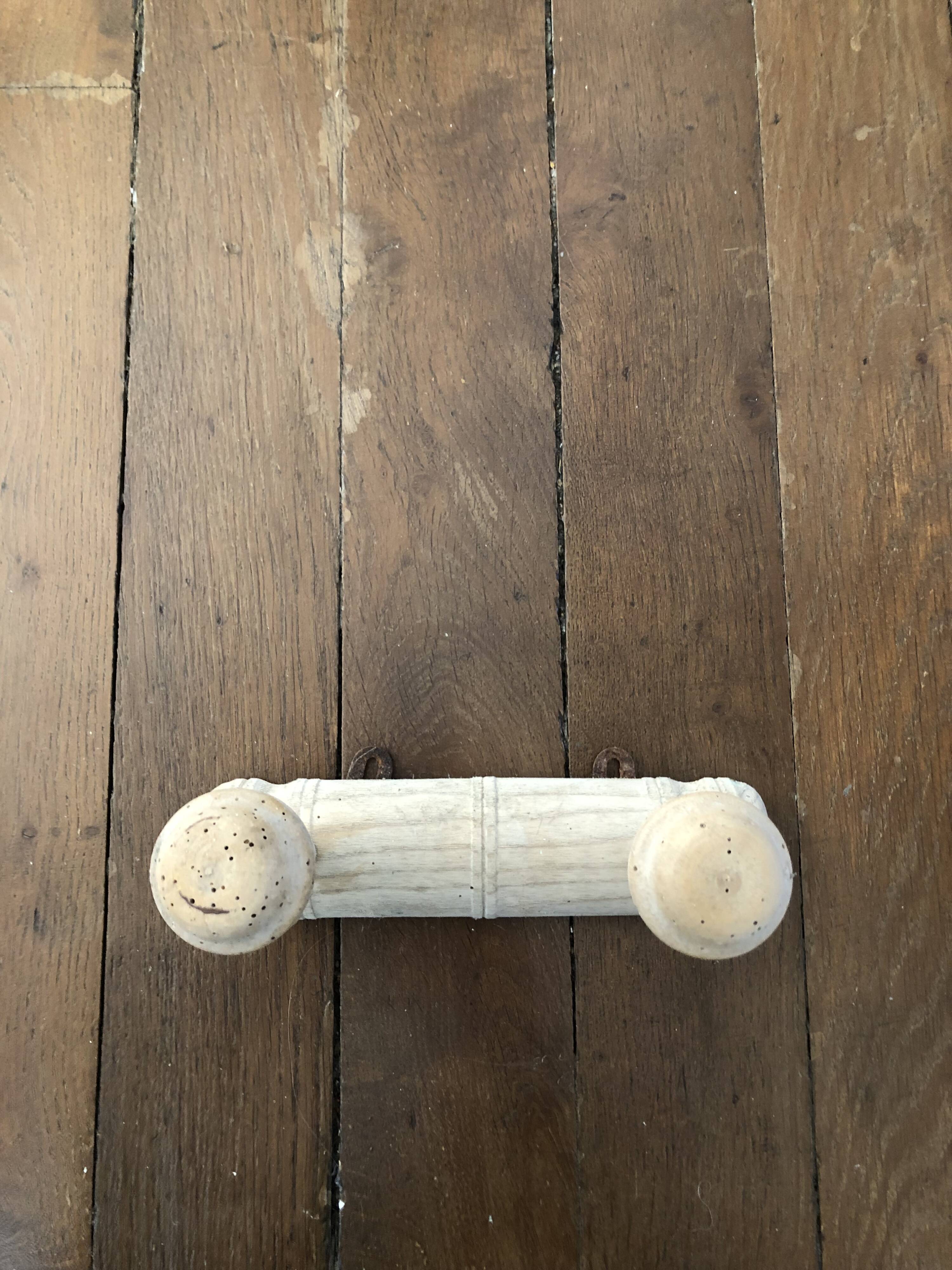 Wall-mounted coat rack, bare wood