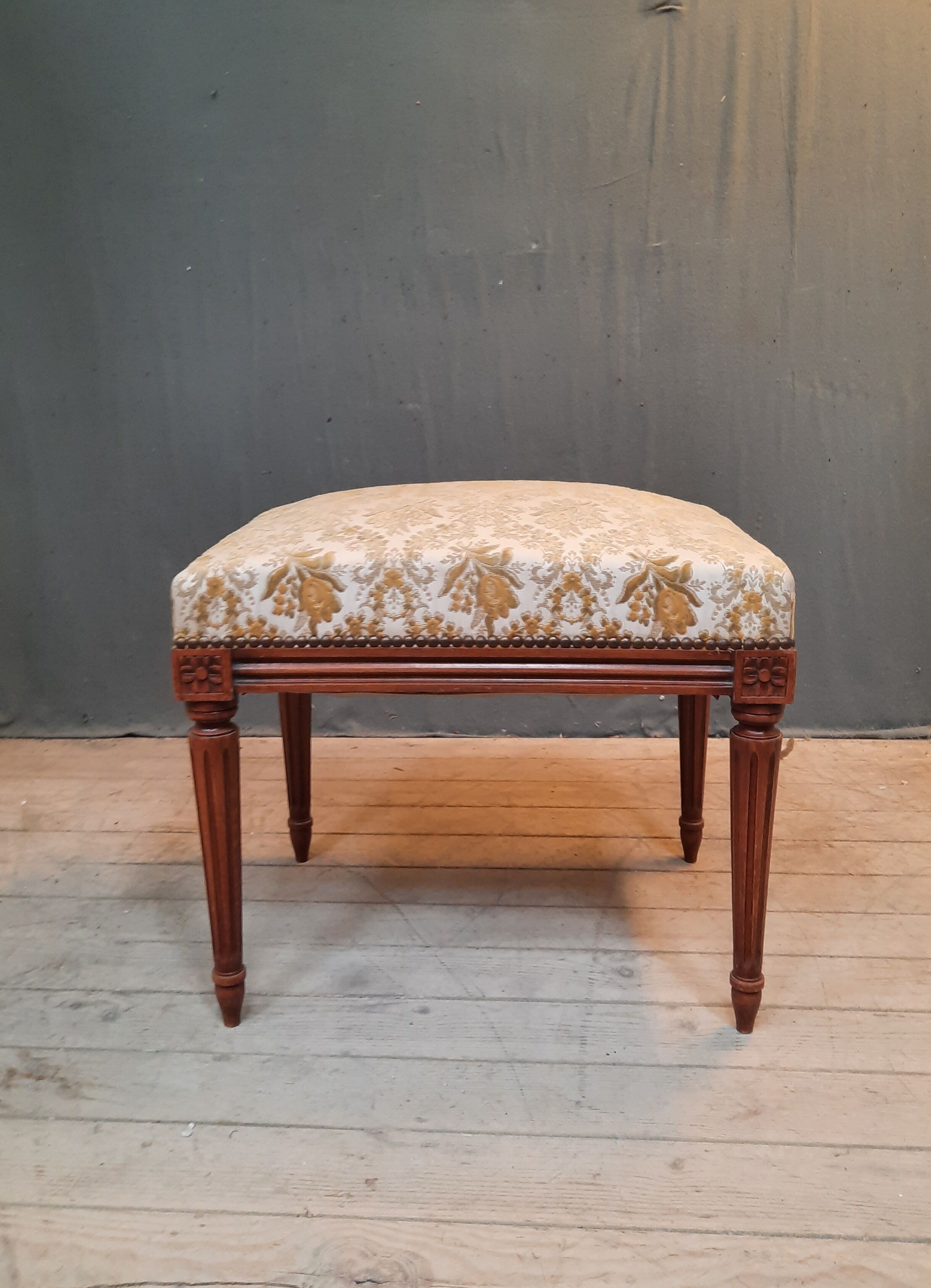 Pouf upholstered in Louis XVI style