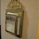 Wall cabinet / vintage mirror in gilded brass