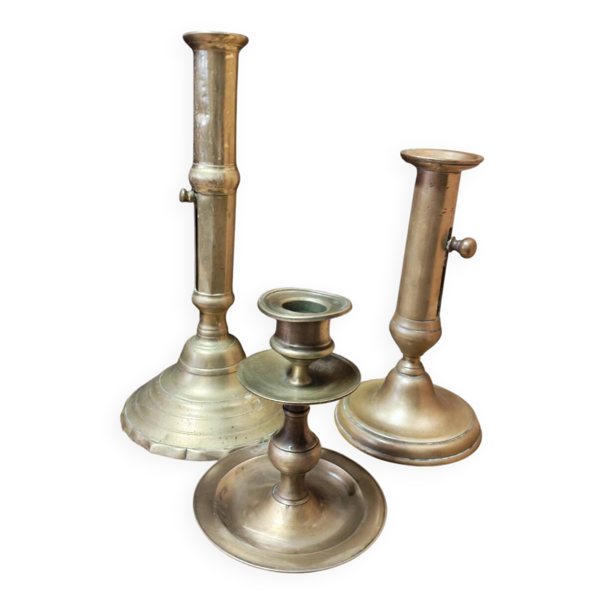 Set of three solid brass candle holders