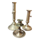 Set of three solid brass candle holders