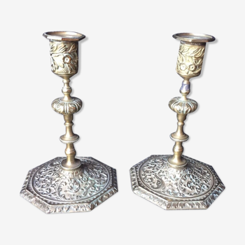 Pair of fully chiseled bronze candlesticks