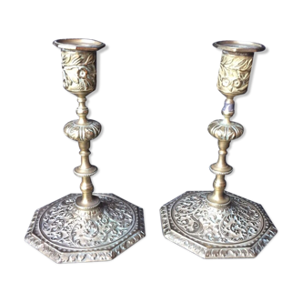 Pair of fully chiseled bronze candlesticks
