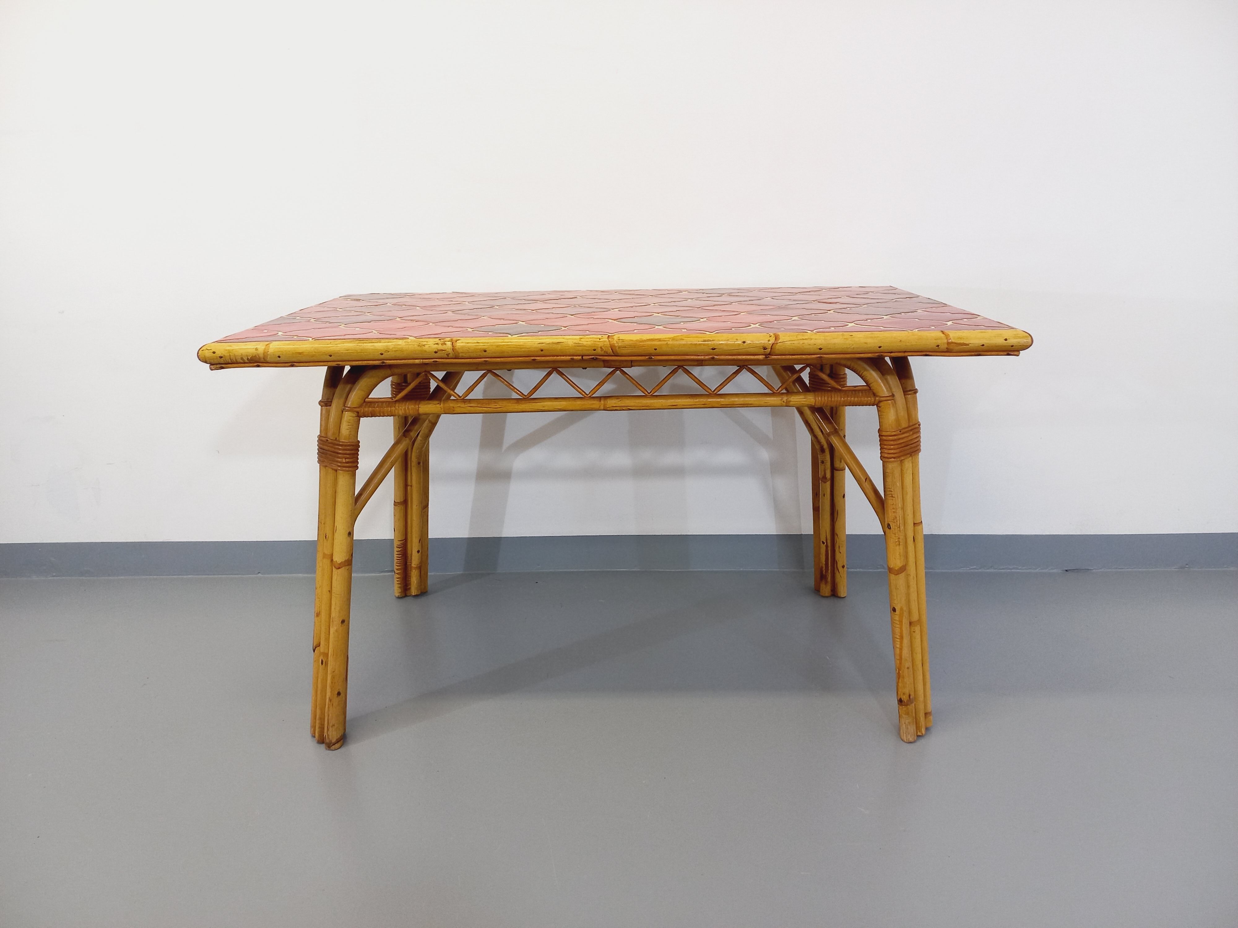 Vintage dining table in rattan and ceramic from Vallauris from the 50s and 60s