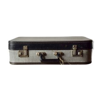 Old cardboard suitcase with its two keys