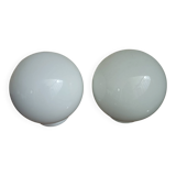Pair of spherical lampshades in opaline.