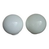 Pair of spherical lampshades in opaline.
