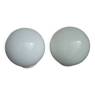 Pair of spherical lampshades in opaline.