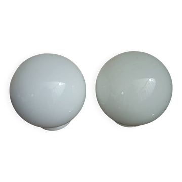 Pair of spherical lampshades in opaline.