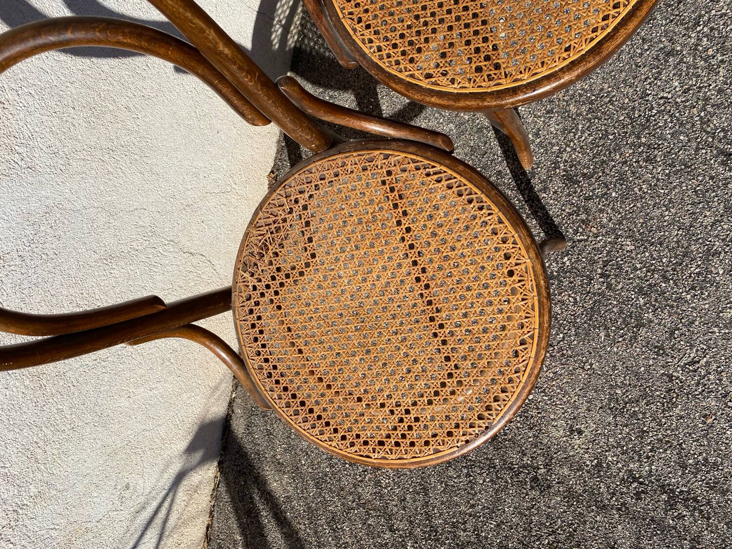 Set of 4 wooden and cane bistro chairs