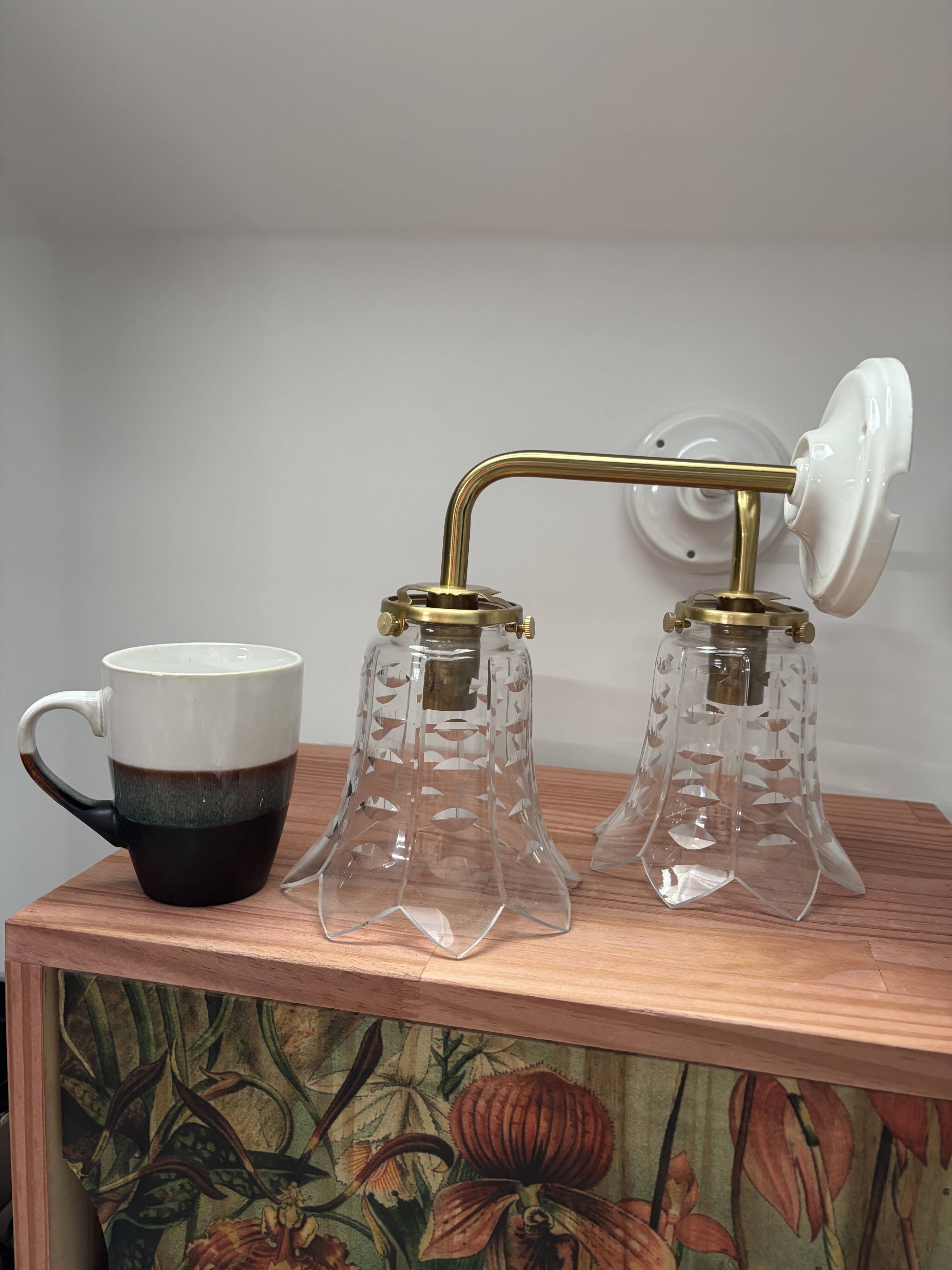 Pair of ceramic and glass wall sconces