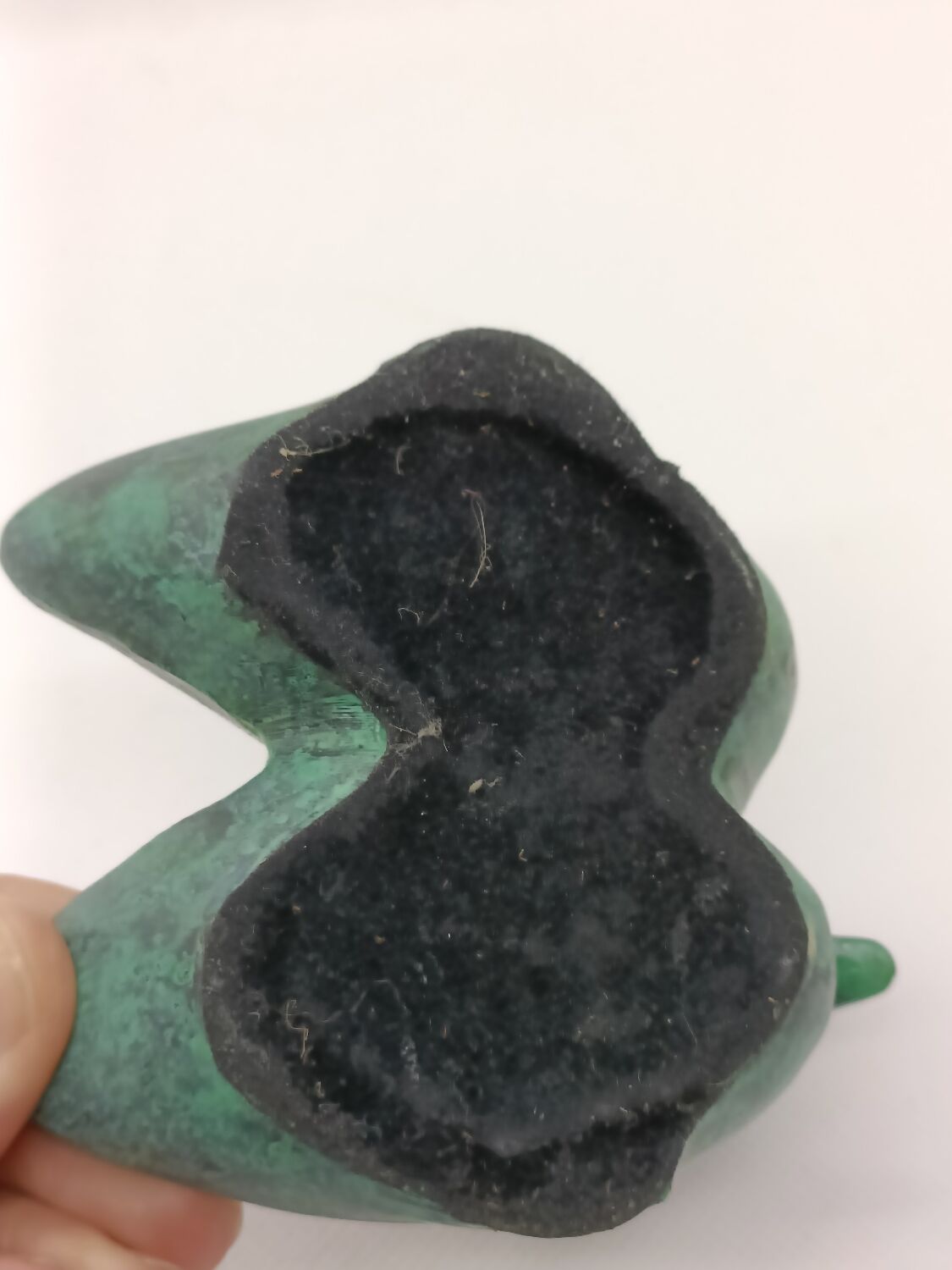 Two green and golden ducks in brass