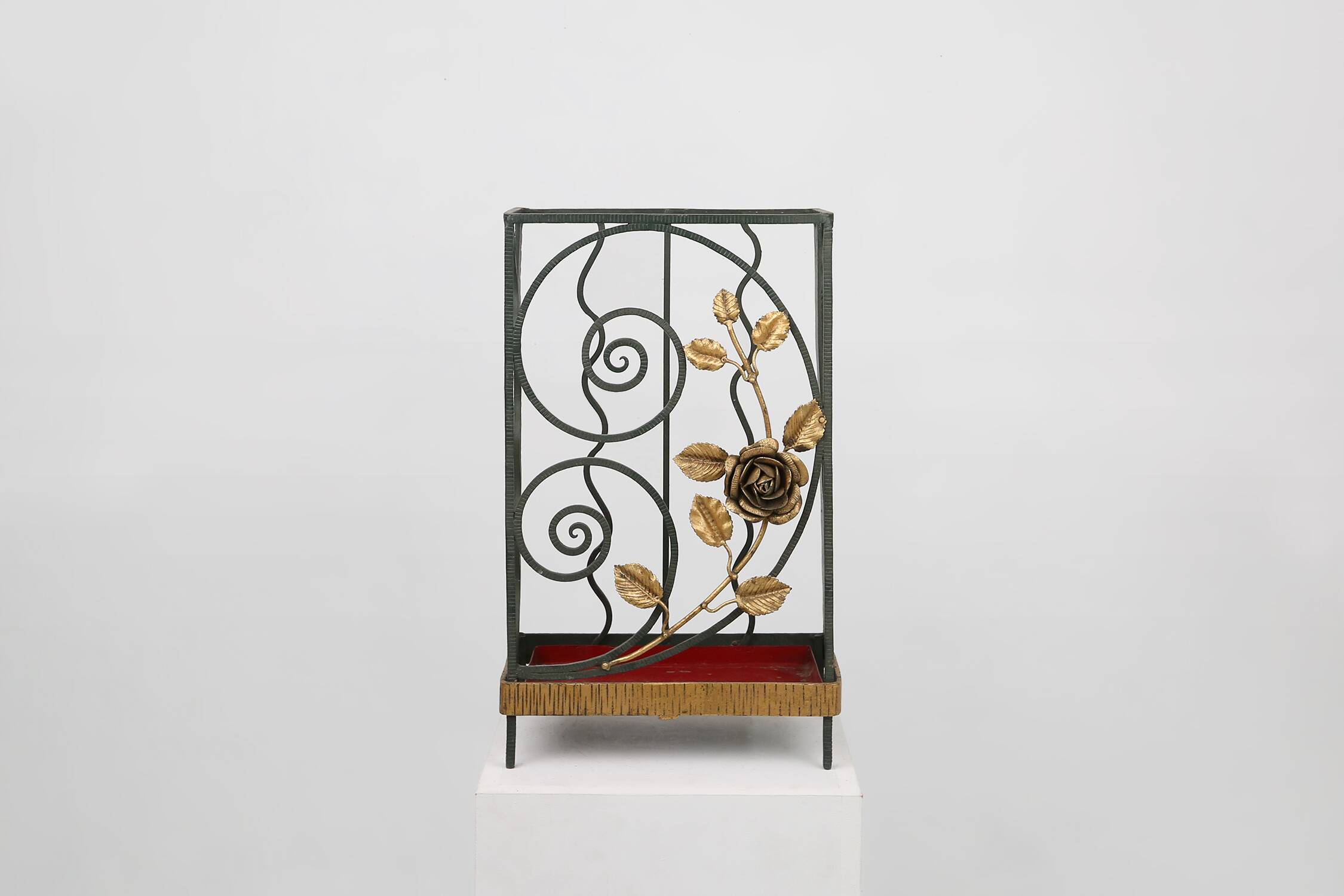 Art deco wrought iron umbrella stand with floral decoration, France ca. 1930