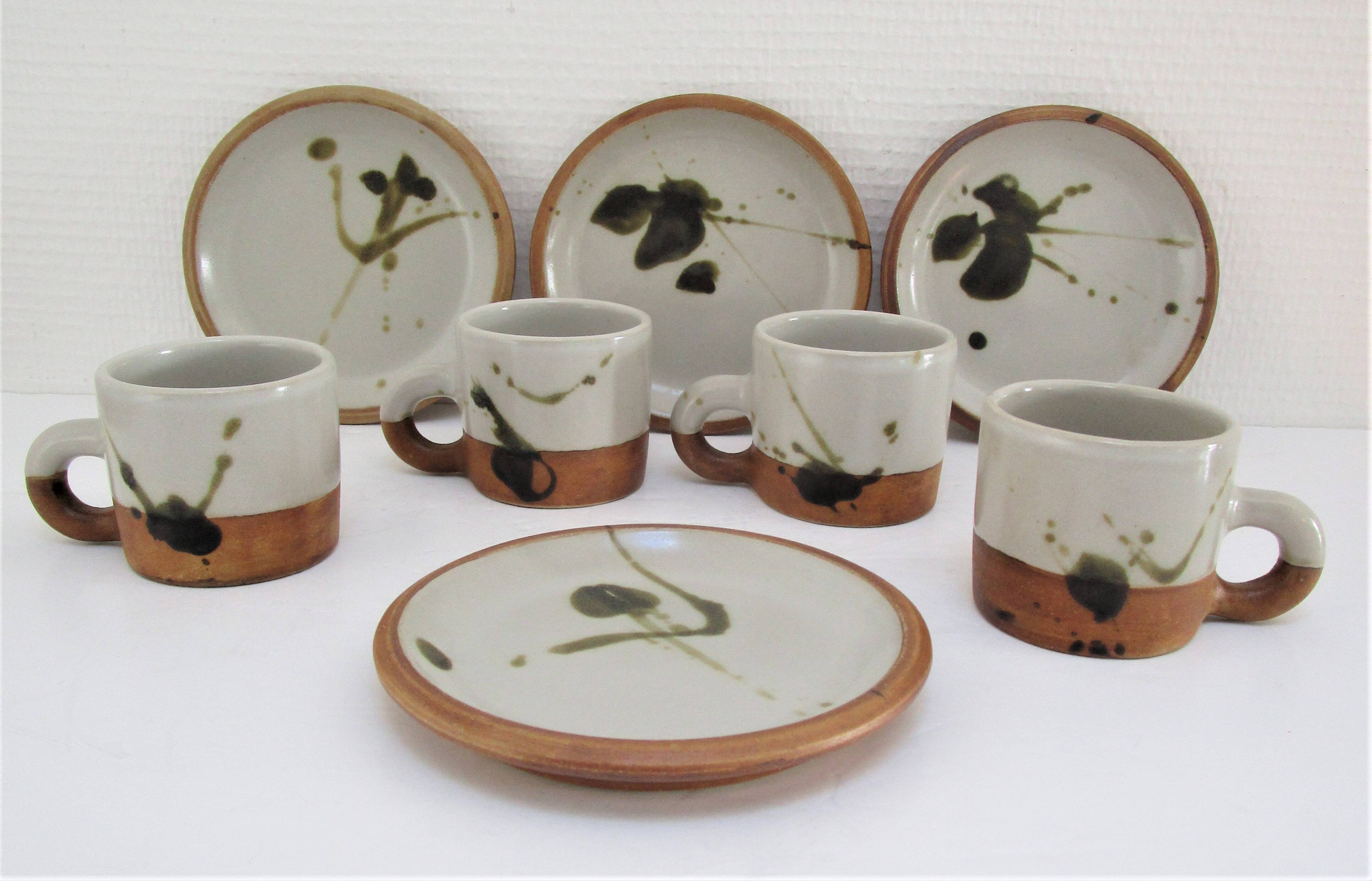Four pottery cups and saucers from La Colombe Vallauris