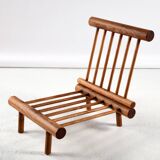 Pair of low chairs called La cachette selected by Charlotte Perriand