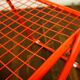 Red "grid" metal folding chair 1980