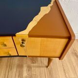 Vintage furniture revamped in navy blue, terracotta, and gold leaf – Reimagined mid-century style.