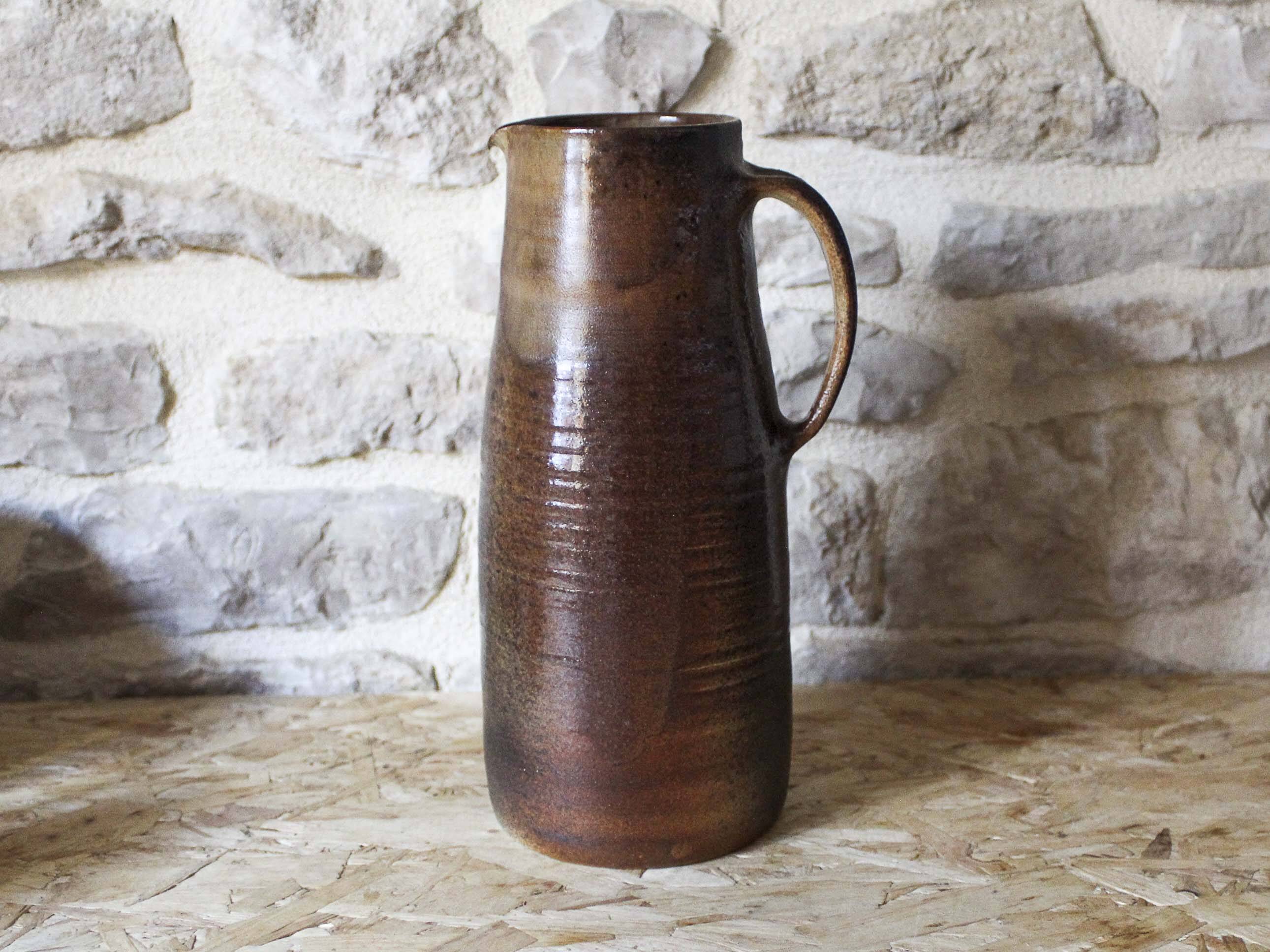 Pitcher service and 6 ceramic cups