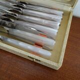 12 knives style Art Deco stainless steel in case