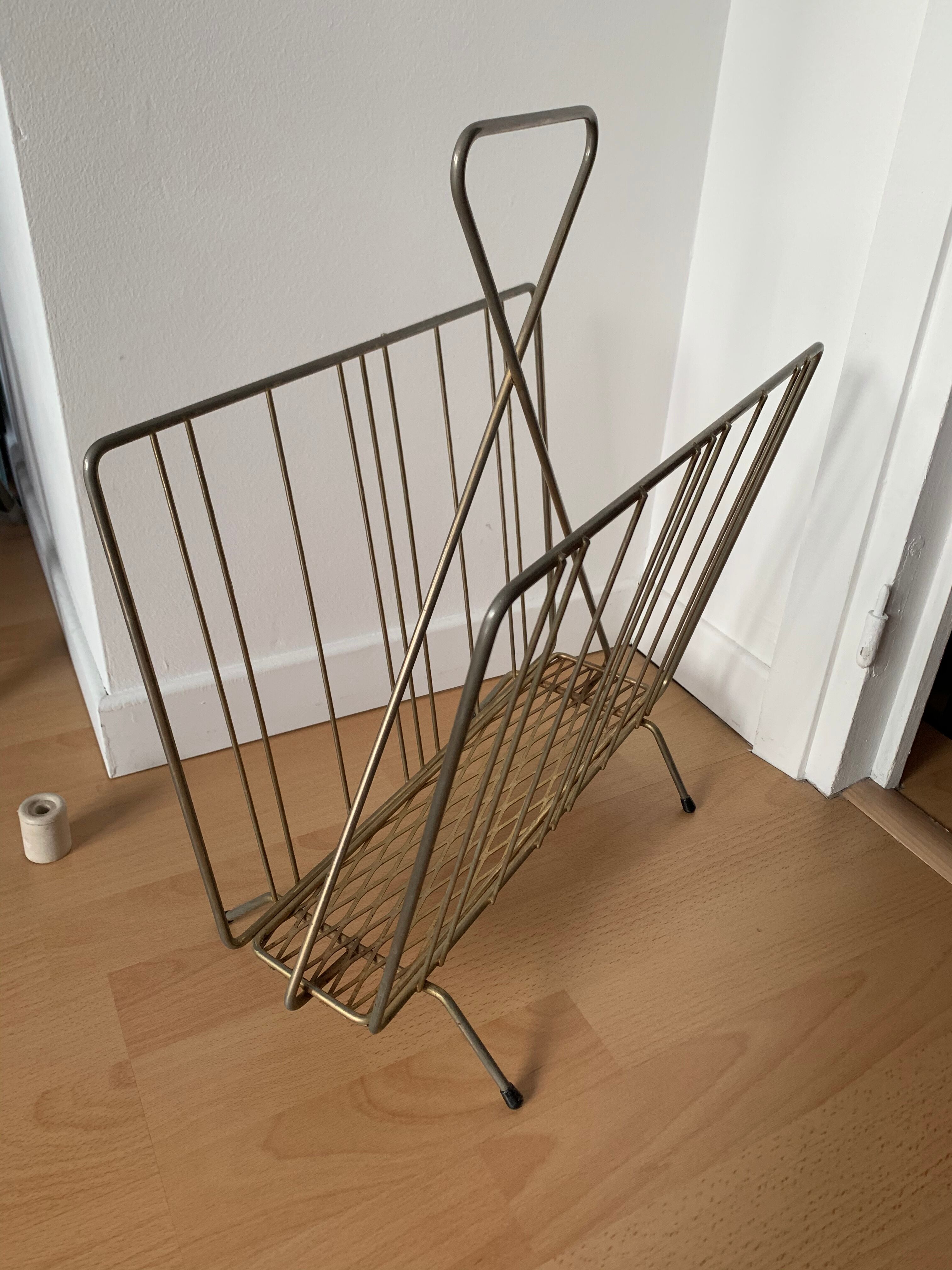 Golden magazine holder