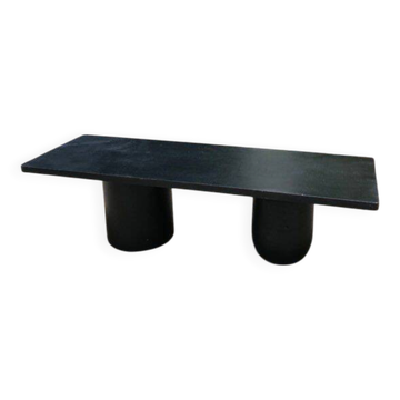 Table basse rectangle en bois teinté noir pied boule et cylindrique.