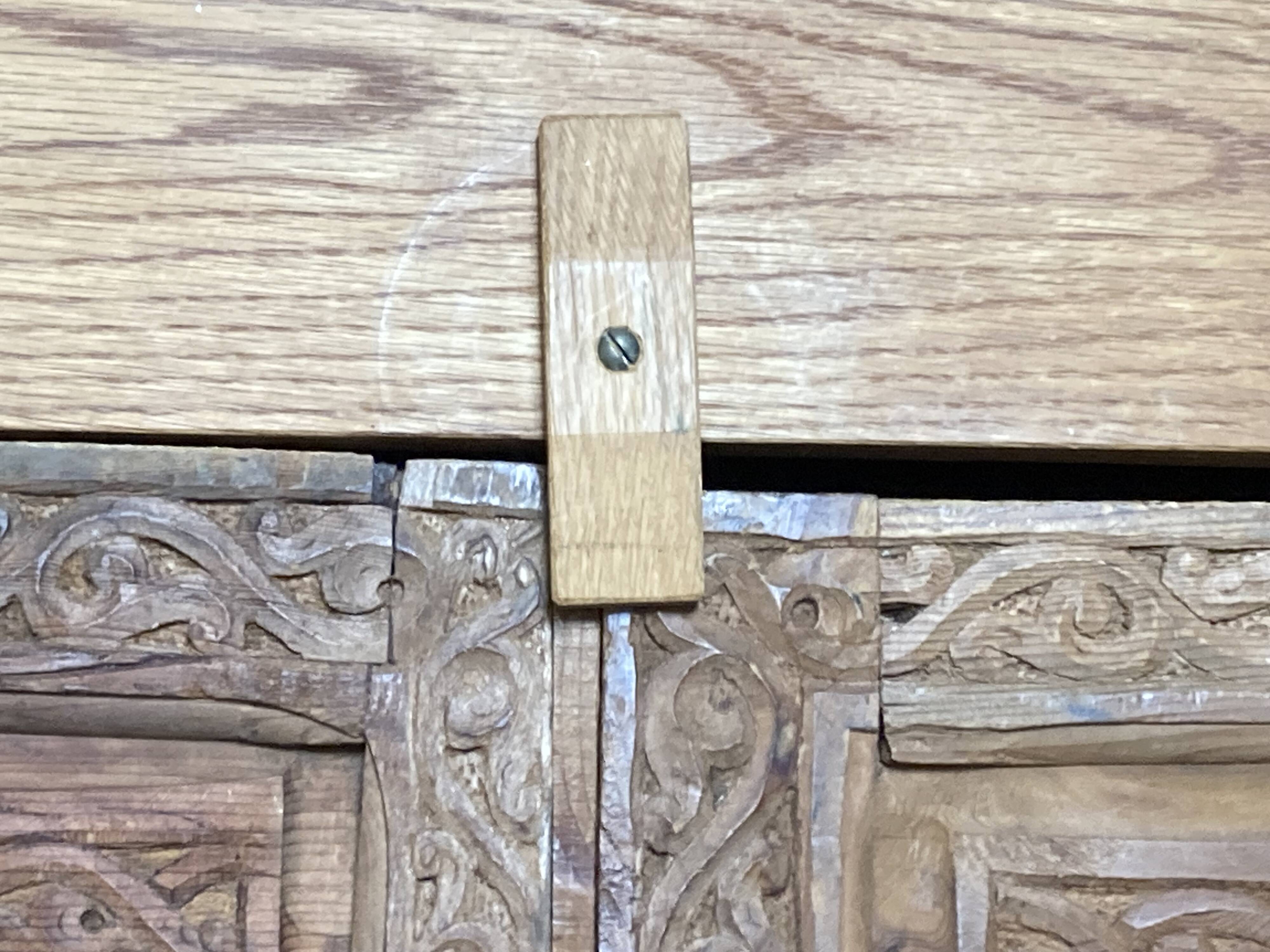 Wardrobe with exotic carved doors
