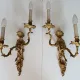 Pair of Régence style wall sconces in gilded bronze